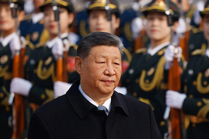 习近平上任以来虽未曾间断反腐与局部清洗，但无论是军队系统、政府系统，还是司法系统，均维持正常运转。(Photo by Maxim Shemetov-Pool/Getty Images)