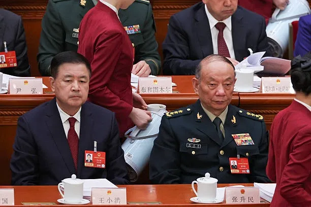 2026年3月5日，公安部部長王小洪在北京人民大會堂出席全國人民代表大會開幕會。（FLORENCE LO / POOL / AFP via Getty Images）